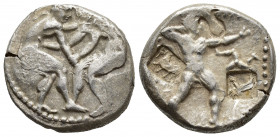 Pamphylia, Aspendos. AR Stater (23 mm, 11.1g), c. 420-400 BC. Obv. Two wrestlers grappling. Rev. ESTFF, slinger to right; triskeles in field. Counterm...