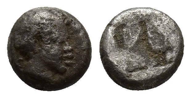 IONIA, Uncertain. Circa 500-490 BC. AR Obol (7mm, 0.7 g ). Female? head right, w...