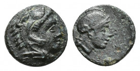 Mysia, Pergamon, c. 310-282 BC. Æ (9mm, 0.9g ). Head of Herakles r., wearing lion skin. R/ Helmeted head of Athena r.