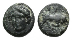 IONIA. Phygela. Ae (Circa 350-300 BC). (7.5mm, 0.4 g) Obv: Head of Artemis Munychia facing slightly left. Rev: ΦΥΓ. Bull butting right; astragalos in ...