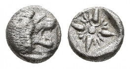 Ionia, Miletos. Late 6th-early 5th centuries B.C. AR diobol (7.8 mm, 1.08 g). Forepart of lion left, head turned to look back / Stellate design within...