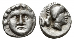 Selge , Pisidia. AR Obol (9mm, 1.00 g) Obv. Facing head of Gorgoneion Rev. Helmeted head of Athena right, astragal behind.