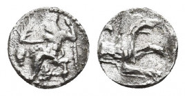 Cilicia. Uncertain mint circa 400-300 BC. Obol AR (9.3mm., 0,58g) . Baaltars seated left, holding grain ear and grapes in his right and sceptre in his...
