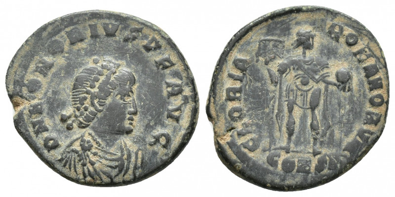 Honorius. AD 393-423. Æ Follis DN HONORIVS PF AVG. Pearl-diademed, draped and cu...