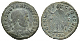Constantine I (307/310-337). Æ Follis (20mm, 4.00g ). AD 310. Laureate and cuirassed bust r. R/ Sol standing l., extending arm and holding globe; S-F....