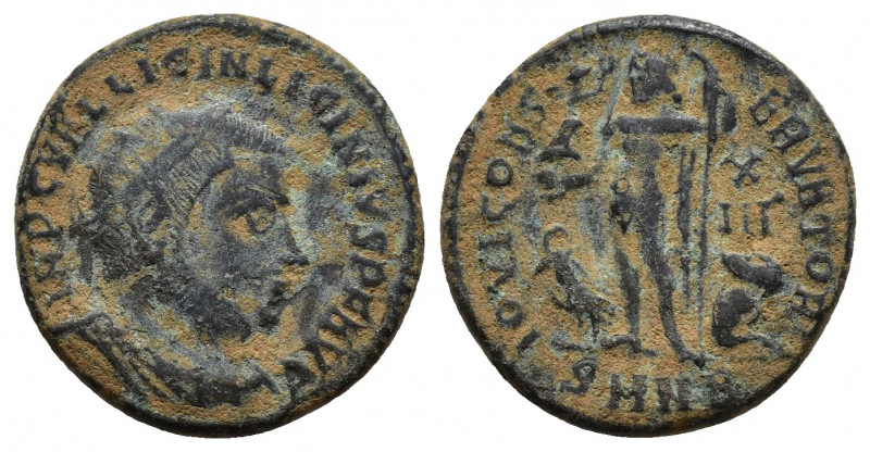 Licinius I (308-324). Æ Follis (18mm, 3.4g ). Heraclea, 321-324. Radiate, draped...