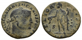 Licinius I (308-324). Æ Follis (22mm, 6.5g ). Cyzicus, c. 311. Laureate head r. R/ Genius standing l., holding patera, from which liquid flows, and co...