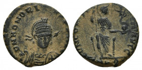 Honorius (393-423). Æ (15.3mm, 2.58g ). Constantinople?. Helmeted and cuirassed bust facing three-quarters r., holding spear over shoulder and shield....