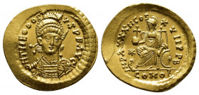 Theodosius II (402-450 AD). AV Solidus (22 mm, 4.7 g), Constantinople. Obv. D N THEODOSIVS P F AVG, Facing, cuirassed bust with crested helmet, holdin...