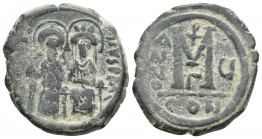 Justin II with Sophia, 565 - 578 AD AE Follis, Constantinople Mint, (29mm, 13.0 g) Obverse: Justin on left and Sophia on right, seated facing on doubl...