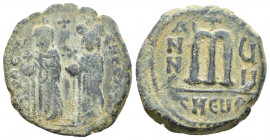 Phocas with Leontia, 602 - 610 AD AE Follis, Theoupolis Mint, (26mm, 9.9 g) Obverse: O N FOCA NE PE AV, Phocas on left and Leontia on right, standing ...