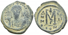 Tiberius II Constantine (578-582). Æ 40 Nummi (30mm, 14.8g ). Constantinople,. Crowned facing bust, holding globus-cruciger and shield. R/ Large M; ch...