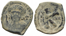 JUSTINIAN I (527-565). Half Follis. Antioch. (26mm, 10.4 g ) Obv: D N IVSTINIANVS P P AVG. Helmeted and cuirassed bust facing, holding globus cruciger...