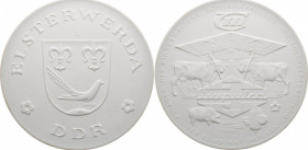 Medaillen der Meißner Porzellanmanufaktur
 Weiße Porzellanmedaille o.J. (1975), auf das VEB Kombinat Impulsa. 328,27 g., 148 mm. Weigelt 6198. R In E...