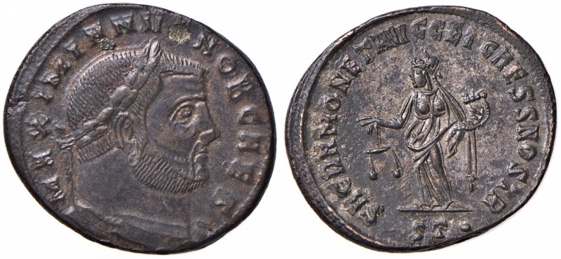 Galerio (305-311) Follis (Ticinum) Busto a d - R/ Genio stante a s. - AE (g 9,86...