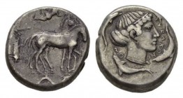 Sicily, Syracuse Tetradrachm circa 460-440, AR 24mm, 17.12 g. Slow quadriga driven r. by charioteer, holding kentron and reins; above, Nike flying r. ...