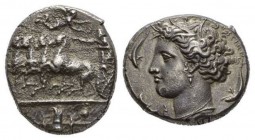 Syracuse, Syracuse Decadrachm work by Euainetos circa 400, AR 35.5mm, 43.20 g. Fast quadriga driven l. by charioteer, holding reins and kentron; in fi...