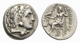 Kingdom of Macedonia. Philip III, 323-317 Drachm, Colophon circa 323-319, AR 27mm, 4.29 g. Head of young Heracles right, wearing lion’s skin. Rev. ΦIΛ...