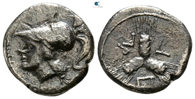 Apulia. Arpi 215-212 BC. 
Triobol AR

14mm., 1,88g.

Helmeted head of Athen...
