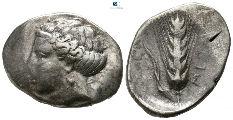 Lucania. Metapontion 400-340 BC. 
Nomos AR

23mm., 7,39g.

Head of Demeter ...