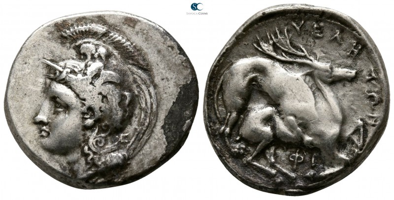 Lucania. Velia circa 350 BC. 
Nomos AR

20mm., 7,33g.

Head of Athena left,...