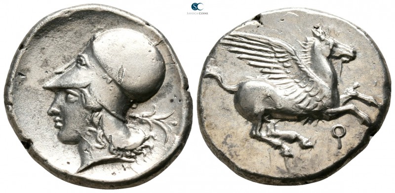 Corinthia. Corinth 400-375 BC. 
Stater AR

22mm., 8,42g.

 Helmeted head of...