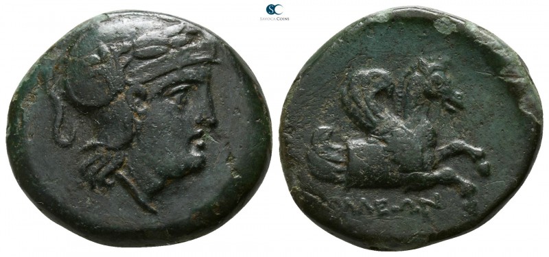 Mysia. Iolla circa 400 BC. 
Bronze Æ

18mm., 6,68g.

Helmeted and laureate ...