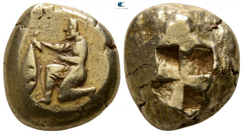 Mysia. Kyzikos 500-450 BC. 
Stater EL

15mm., 16,08g.

Nude youth kneeling ...