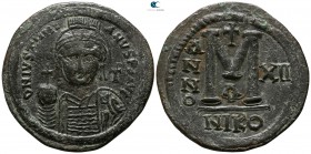 Justinian I. AD 527-565. Constantinople. Nummus Æ