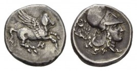 Acarnania, Anactorium Stater circa 350-300, AR 22mm, 8.49 g. Pegasus flying left, below, AN ligate. Rev. Head of Athena right, wearing Corinthian helm...