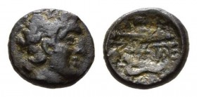 Lokris, Lokri Ozolae Amphissa Bronze, first half of the 2nd century BC. Æ 16.5mm, 4.30 g., 12¢. Head of Apollo right, laureate. Rev. Spearhead and jaw...