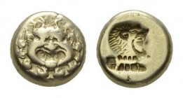 Lesbos, Mytilene Hecte circa 521-478, EL 10.5mm, 2.52 g. Gorgoneion’s head facing, surrounded by snakes. Rev. Head of Heracles right, wearing lion ski...