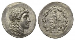 Aeolis, Myrina Tetradrachm after 165, AR 34.5mm, 16.41 g. Laureate head of Apollo right. Rev. MYPINAIΩN Apollo Orynios standing right, holding branch ...
