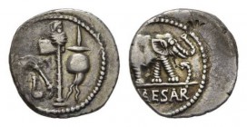Iulius Caesar. Denarius, mint moving with Caesar 49-48. AR 18.5mm, 3.66 g. Pontifical emblems: culullus, aspergillum, axe and apex. Rev. Elephant righ...