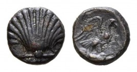 Calabria, Graxa Bronze circa 250-225, Æ 12.5mm., 2.07g. Cockle shell. Rev. Eagle standing right on thunderbolt; in right field, star on crescent. In e...