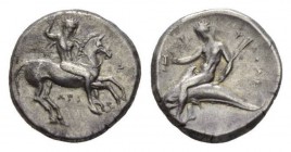 Calabria, Tarentum Nomos circa 315-300, AR 20mm., 7.46g. Naked ephebos on prancing horse right, holding in l. hand, reins, shield and two spears and s...