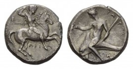 Calabria, Tarentum Nomos circa 315-300, AR 22.5mm., 7.70g. Naked ephebos on prancing horse right, holding in l. hand, reins, shield and two spears and...