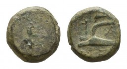 Bruttium, Uncertain "BPEIΓ". Dichalkon (?) Early IV century B.C., Æ 13mm., 2.18g. Head of Stag right; in field K-A. Rev. Plough left; below, BPEIΓ in ...