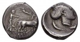 Sicily, Syracuse Tetradrachm circa 420, AR 24.5mm., 17.24g. Slow quadriga driven right by charioteer holding reins and kentron; in field above, Nike f...