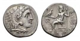 Kingdom of Macedon, Drachm circa 323-319, AR 17.5mm., 4.24g. Head of Heracles right, wearing lion’s skin. Rev. ΦIΛIΠΠOY Zeus seated on throne left, ho...