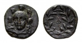 Phocis, Phokian League circa 371-357, Æ 13mm., 2.08g. Helmeted head of Athena facing ¾ left. Rev. Large Φ in berried laurel wreath. McClean addenda 73...