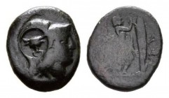 Locri Opuntii, Bronze circa 277-239, Æ 18mm., 6.03g. Kings of Macedon, Antigonos Gonatas (BC 277 - 239). Head of Athena helmeted right, countermark bu...