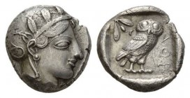 Attica, Athens Tetradrachm circa 415-400, AR 24.5mm., 17.00g. Head of Athena right, wearing crested helmet, earring and necklace; bowl ornamented with...