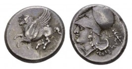 Corinthia, Corinth Stater circa 345-307, AR 21mm., 8.50g. Pegasus flying left; below, Q. Rev. Head of Athena left, wearing Corinthian helmet; behind n...