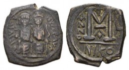 JUSTIN II 565-578 565-578 Follis 575-576, Æ 12.78mm., 29.5g. D N IVSTINVS P P AVG Justin, holding globus cruciger, and Sophia, holding cruciform scept...
