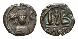 Heraclius 610-641 610-641 12 Nummi 618-628, Æ 18mm., 5.24g. Crowned, draped, and cuirassed facing bust, crown surmounted by cross within crescent; eig...