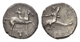 Calabria, Tarentum Nomos circa 280-272, AR 6.32mm., 19.5g. Rider crowning himself on horse pacing to r; below, IΑΛO / Ionic capital. Rev. ΤΑΡΑΣ Dolphi...