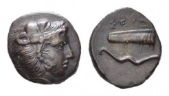 Sicily, Selinus Bronze circa 415 - 409, Æ 15mm., 2.66g. Head of Herakles wearing lion skin right. Rev. ΣE Bow and quiver. SNG ANS 716. Calciati 11.
...