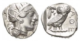 Attica, Athens Tetradrachm circa 415-707, AR 24mm., 17.12g. Head of Athena r., wearing crested helmet, earring and necklace; bowl ornamented with spir...