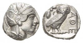 Attica, Athens Tetradrachm circa 415-407, AR 22mm., 17.02g. Head of Athena r., wearing crested helmet, earring and necklace; bowl ornamented with spir...